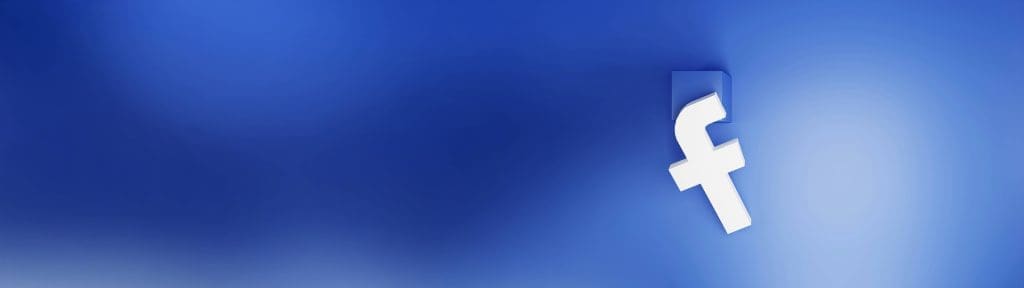 The image shows a white Facebook "f" logo partially embedded in a smooth blue gradient background, with the logo casting a subtle shadow.